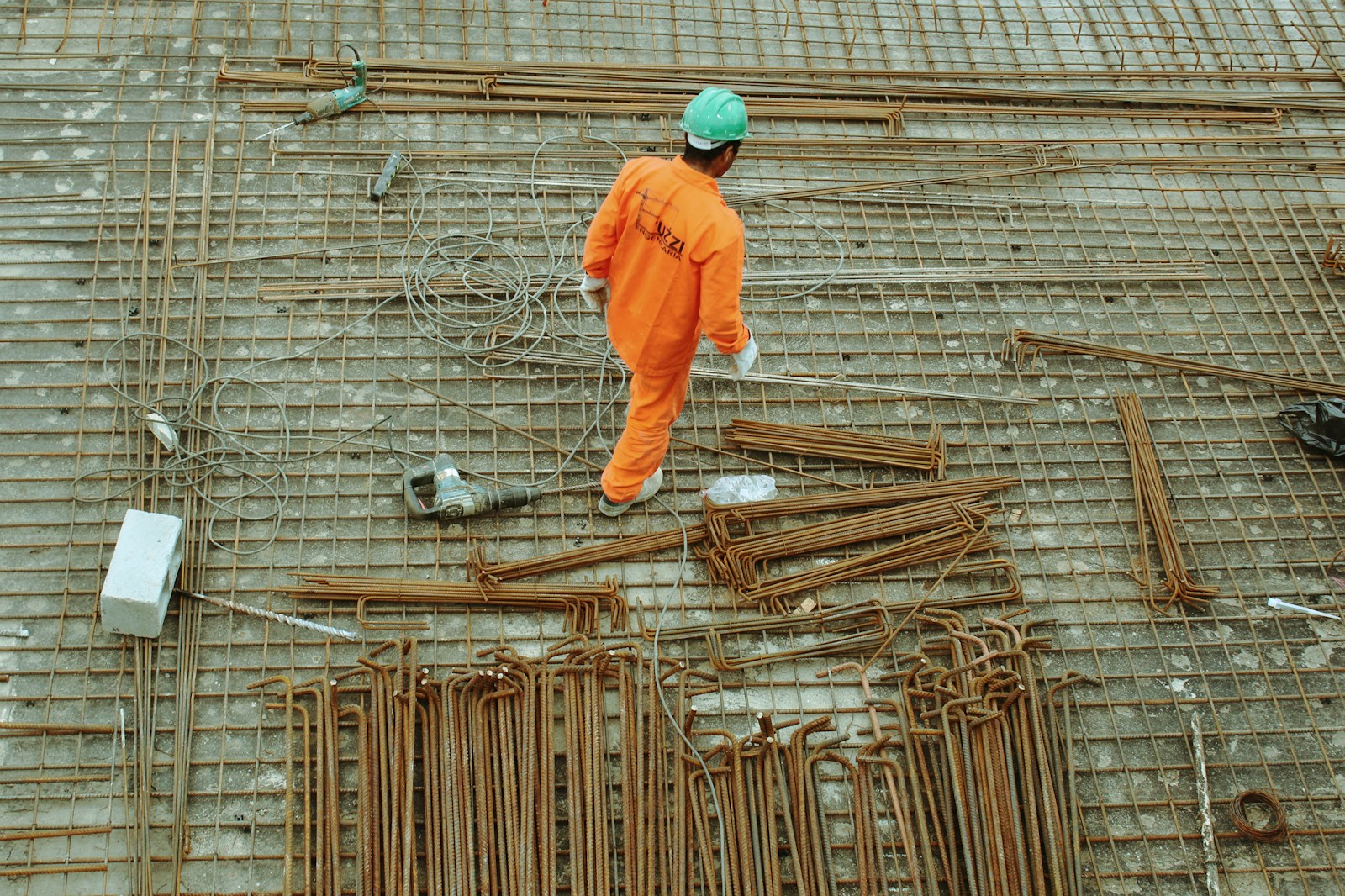 man walking on construction site, contractors